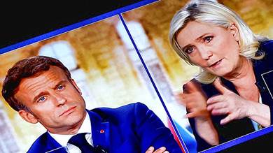 الرئيس الفرنسي يحذر من "حرب أهلية" في حال تم انتخاب منافسته اليمينية المتطرفة رئيسة.